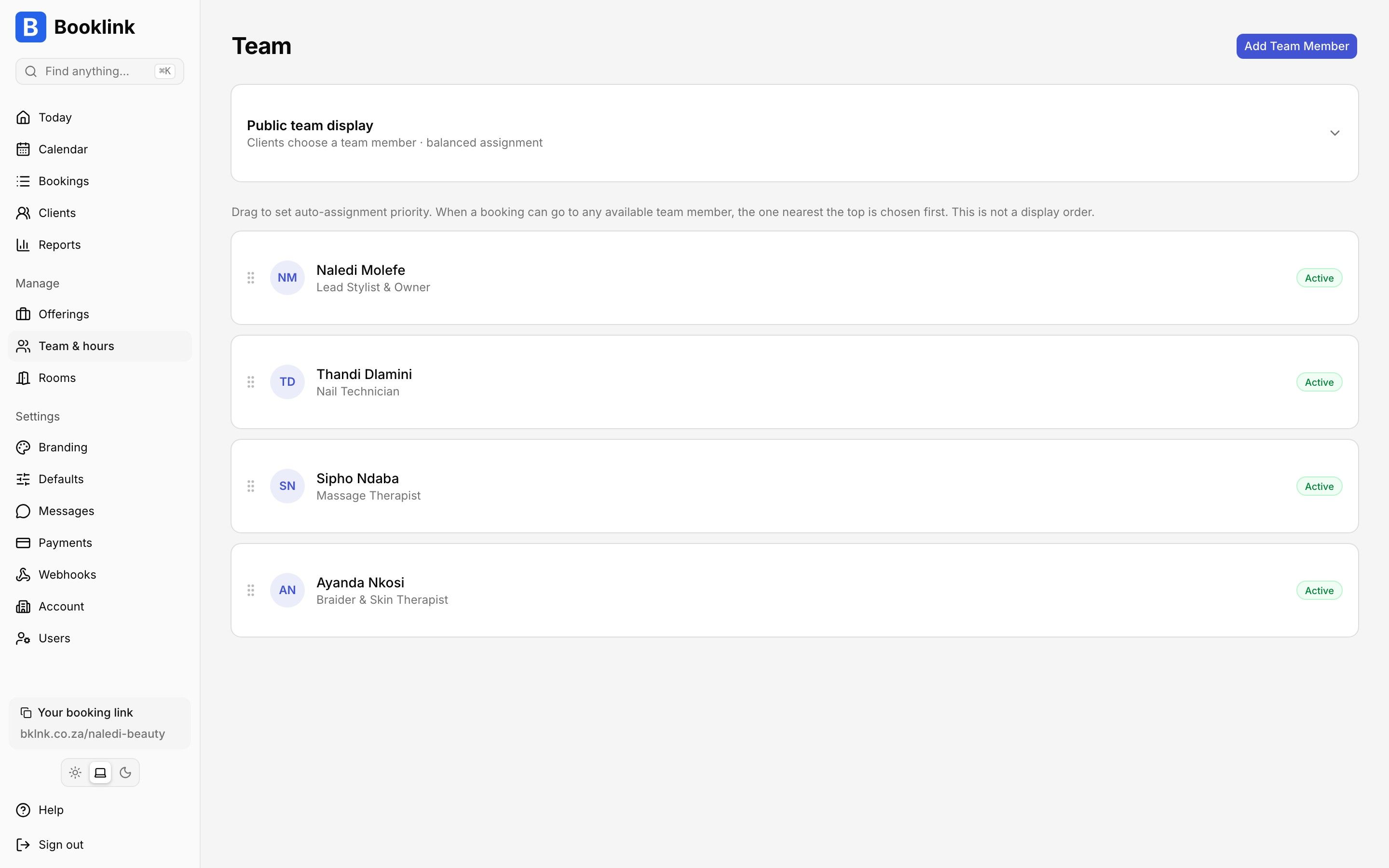 Booklink team management screen listing staff members with roles and availability